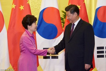 الرئيسة الكورية الجنوبية بارك غيون-هيي والرئيس الصيني شي جين بينغ
