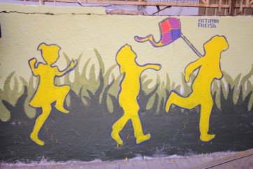 رسم جدار في حي السلم