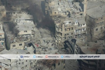 صورة جوية للمنازل التي يقوم المسلحين باحراقها في بلدة عين الفيجة