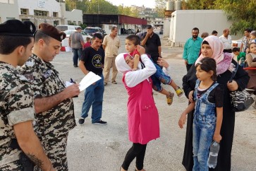 الامن العام ينظم العةدة الطوعية لمئات النازحين السوريين الى سوريا