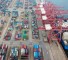 This aerial photo taken on July 14, 2020 shows containers stacked at a port in Lianyungang in China's eastern Jiangsu province. - Chinese trade enjoyed surprise growth in June as the world slowly emerges from economy-strangling lockdowns, though officials warned of headwinds for recovery owing to the spread of the pandemic. (Photo by STR / AFP) / China OUT