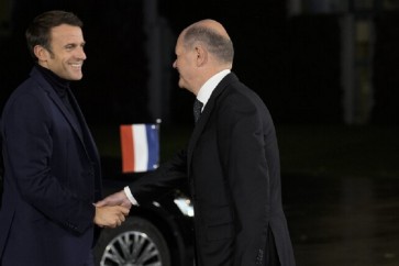 الرئيس الفرنسي ايمانويل ماكرون يجتمع بالمستشار الالماني اولاف شولتس